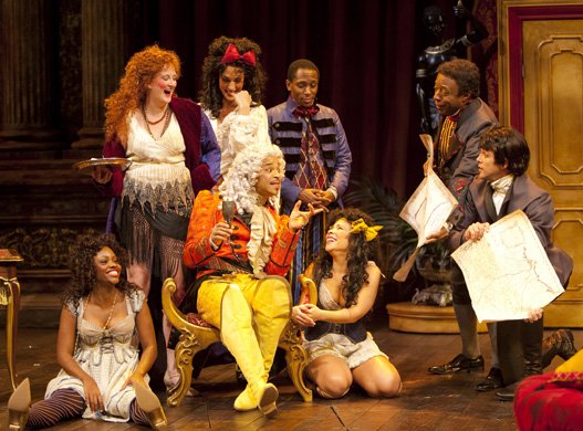 Jeffrey Wright (seated center), Mos (standing center) and company
